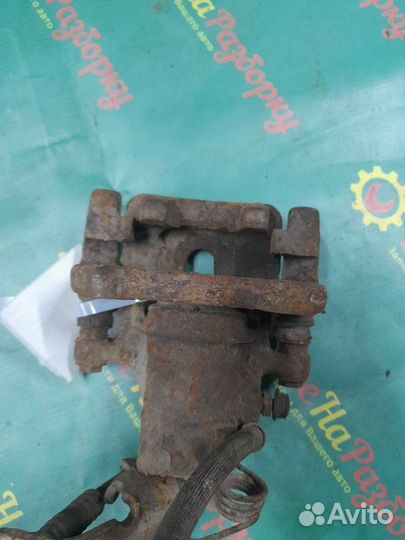 Суппорт задний левый Honda Accord 6