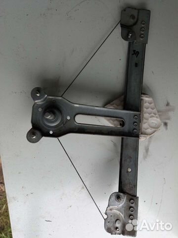 Стеклоподъемник задней левой двери Renault Logan 1