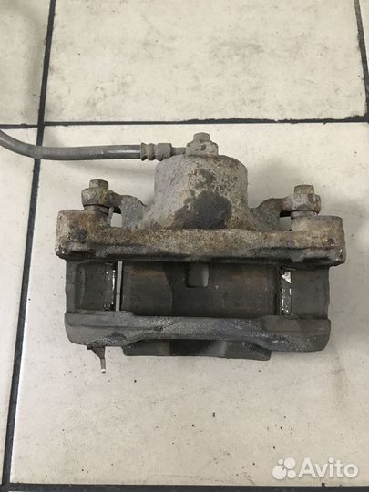 Суппорт тормозной Nissan Teana J32