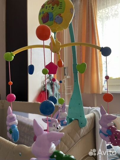 Музыкальный мобиль на кроватку
