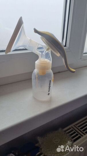 Молокоотсос medela ручной