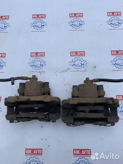 Суппорт тормозной передний правый левый Opel Astra