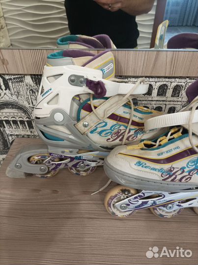 Роликовые коньки