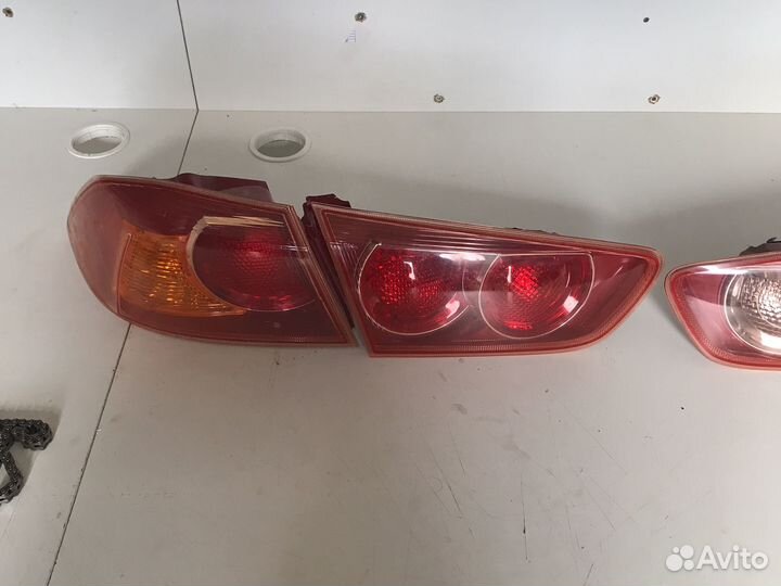 Фары задние ланцер 10