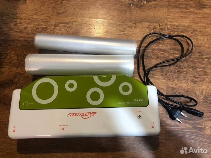 Вакуумный упаковщик вакууматор