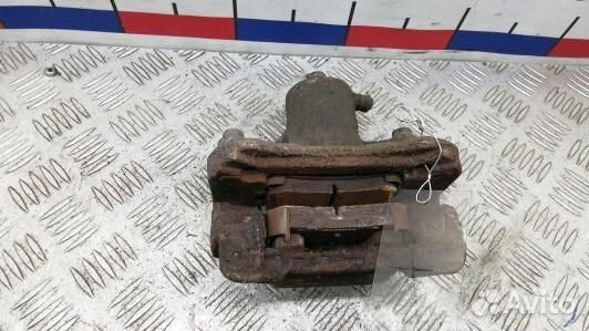 Суппорт тормозной задний правый hyundai IX35 1 (HD