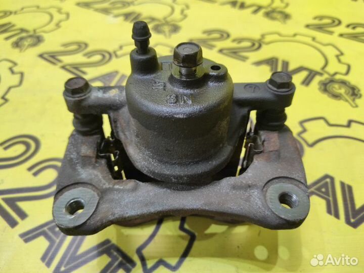 Суппорт передний левый Toyota Corolla Allex NZE121