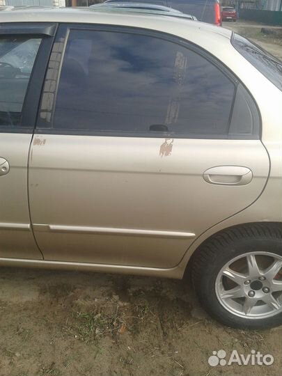 Киа спектра дверь задняя