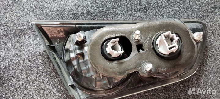 Фонарь в крышку багажника Mitsubishi Lancer X