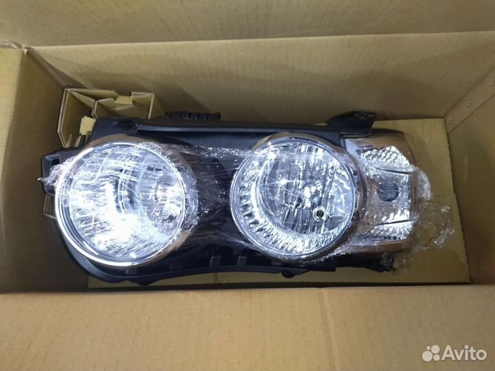 Фара левая Chevrolet Aveo T300 2011
