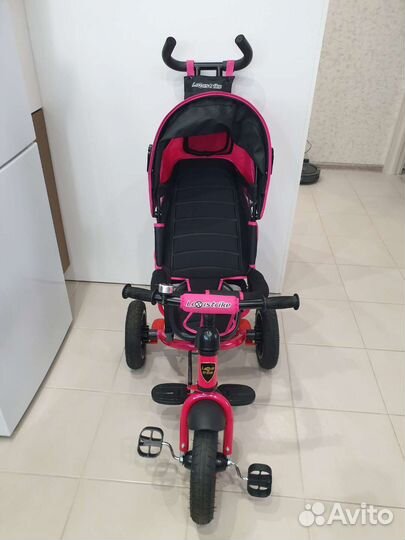 Трехколесный велосипед с ручкой