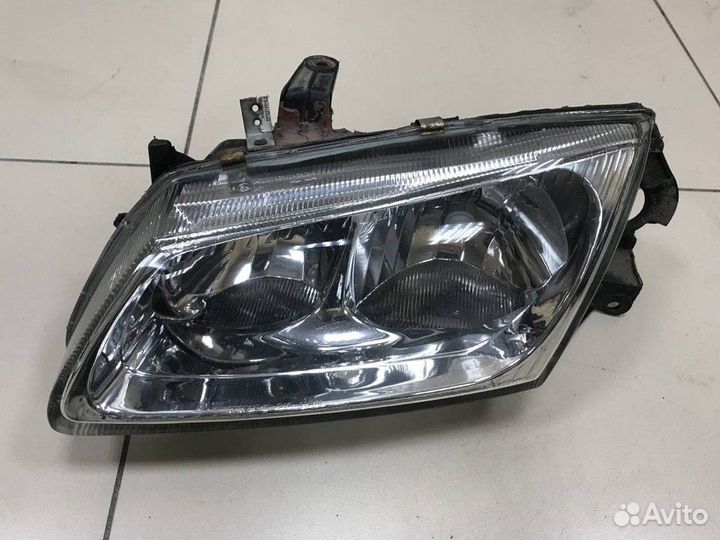 Фара левая Nissan Almera