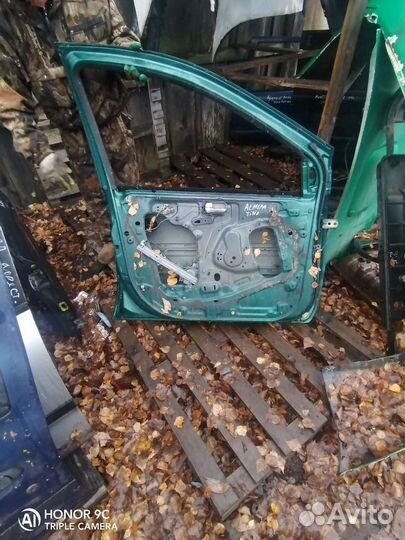 Дверь передняя левая Nissan almera tino