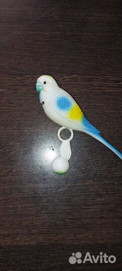 Игрушка для попугая