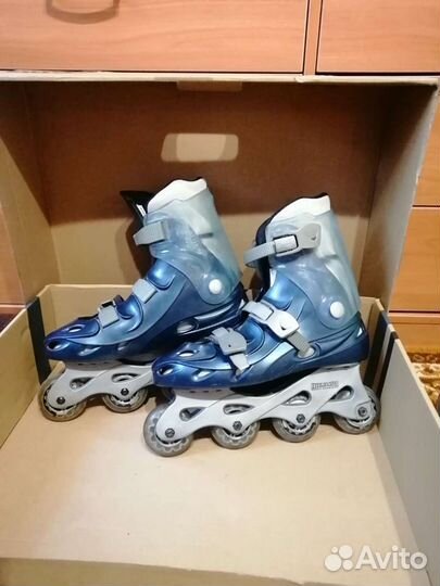 Роликовые коньки