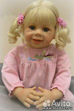 Виниловая кукла