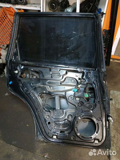 Дверь задняя без молдинга черная Ssang Yong Rexton