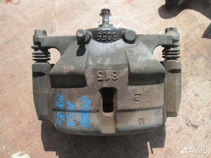 Суппорт передний правый Nissan Xtrail NT31 MR20DE