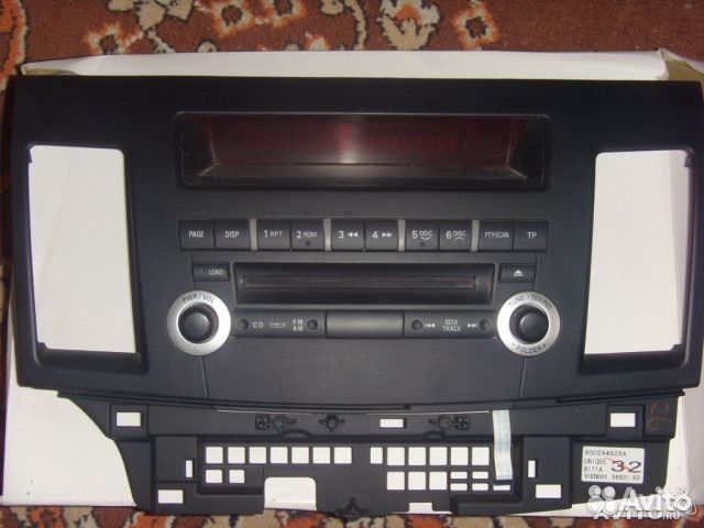 Панель магнитолы для Лансера Х