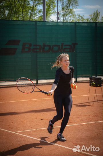 Тренер по большому теннису