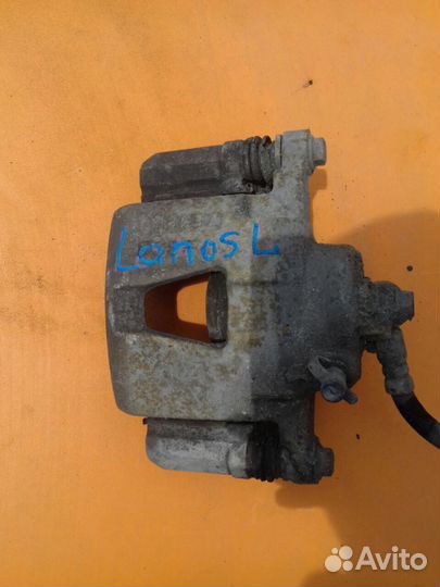 Суппорт тормозной передний Chevrolet Lanos