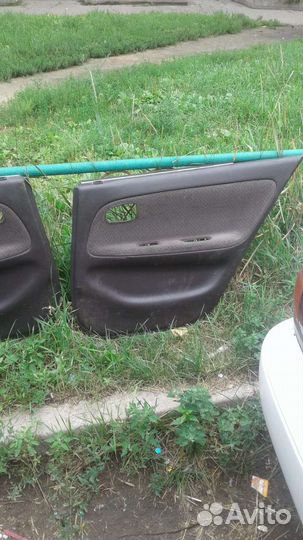 Обшивка на двери Toyota Sprinter ae100