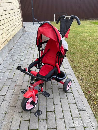 Трехколесный велосипед с ручкой