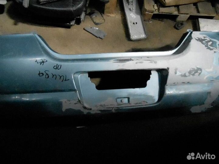 Бампер задний Nissan Tiida 2007-2015