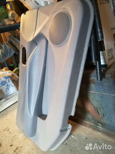 Обшивка двери, левая, передняя на ниссан альмера n