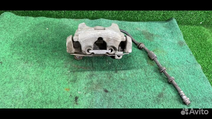 Суппорт тормозной передний левый Volvo V60