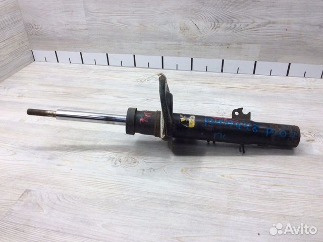 Амортизатор передний левый Peugeot 207 2006-2013