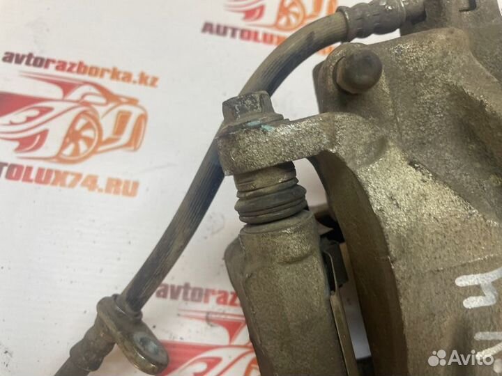 Суппорт тормозной передний правый Honda Cr-V 4 RE5