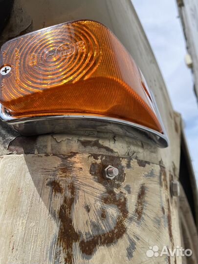 Газ 24 поворотник левый передний