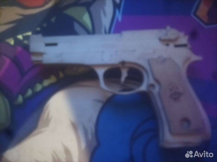 Игрушечный пистолет
