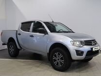 Mitsubishi L200 2.5 MT, 2013, 198 936 км, с пробегом, цена 1 390 000 руб.