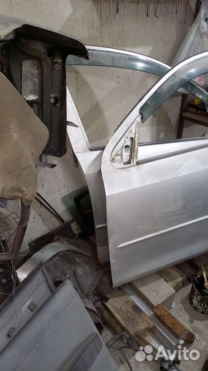 Двери перед mazda demio 2