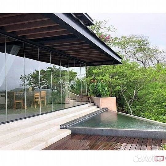 Фасад панорамное безрамное остеклени