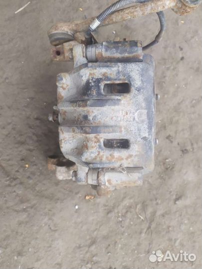 Суппорт перед.левый Kia Sorento 2002-2009