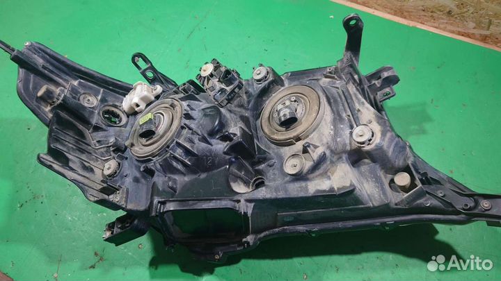 Фара передняя левая TLC200