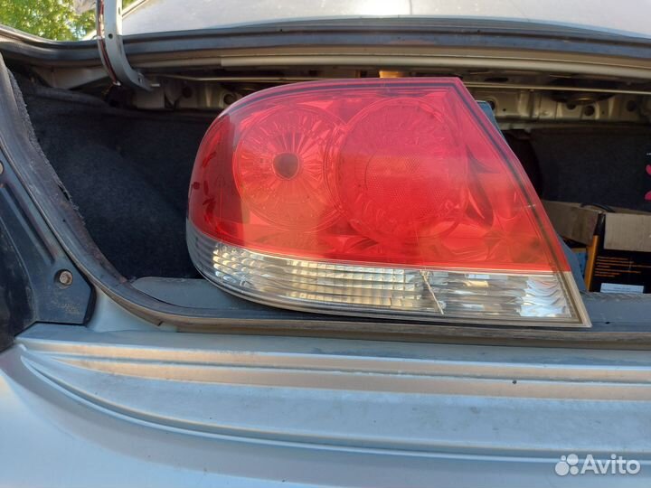Фонарь задний левый lancer 9