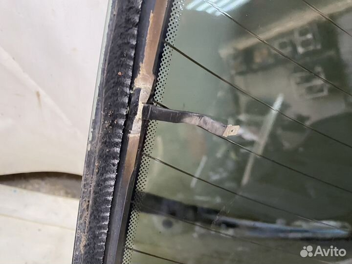 Стекло заднее Рено Меган 2