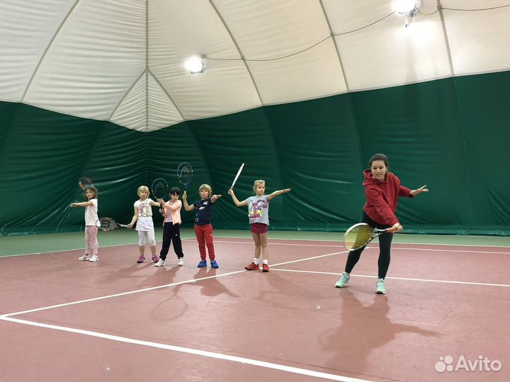 Тренер по большому теннису