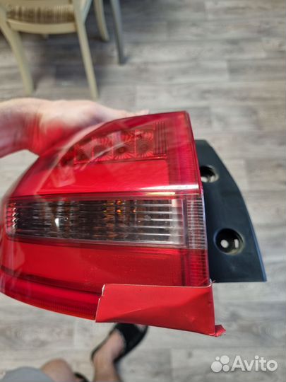 Фонарь задний наружний левый Geely Atlas7057003400