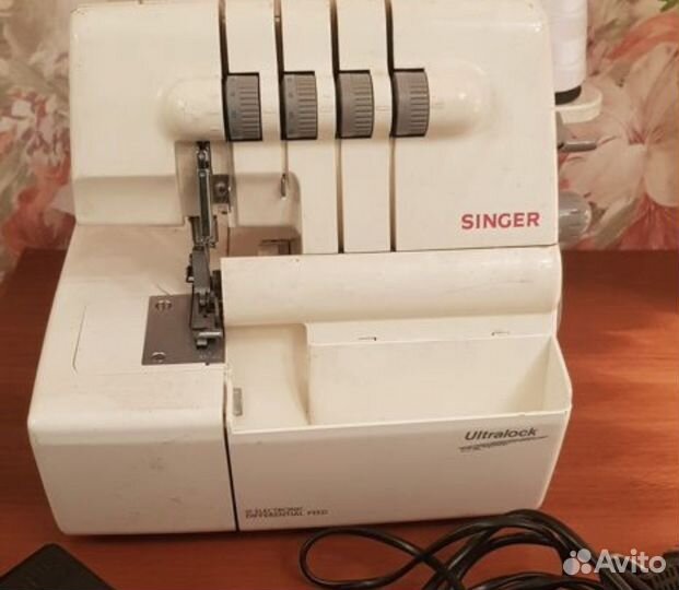 Оверлок четырехниточный Singer