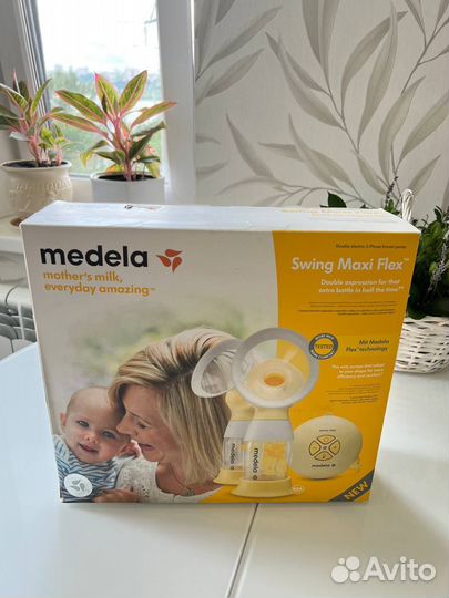 Молокоотсос medela swing maxi flex