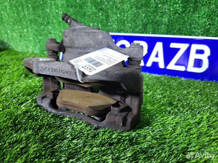 Суппорт тормозной передний левый Citroen C3 Ii