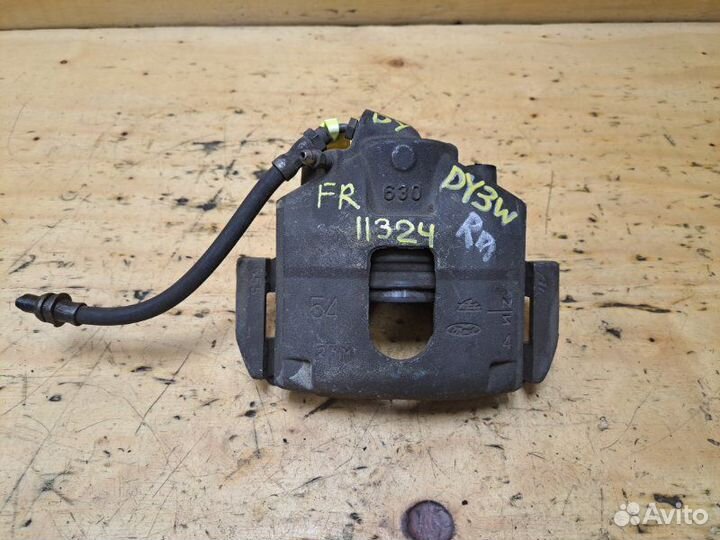 Суппорт передний правый Mazda Demio DY3W zjve 2004