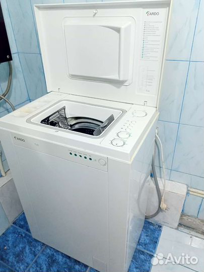 Стиральная машина с вертикальной загрузкой