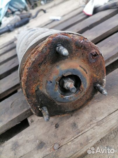 Стойка передняя левая Mazda 6GG 2.0