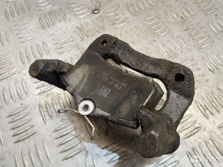 Скоба заднего суппорта с колодками Golf 4